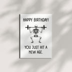 Skeleton Birthday Card “You Just Hit a New Age” – Hilarious Greeting Card for Kids, Friends, Men, Women – Universal Birthday Humor – Made in USA